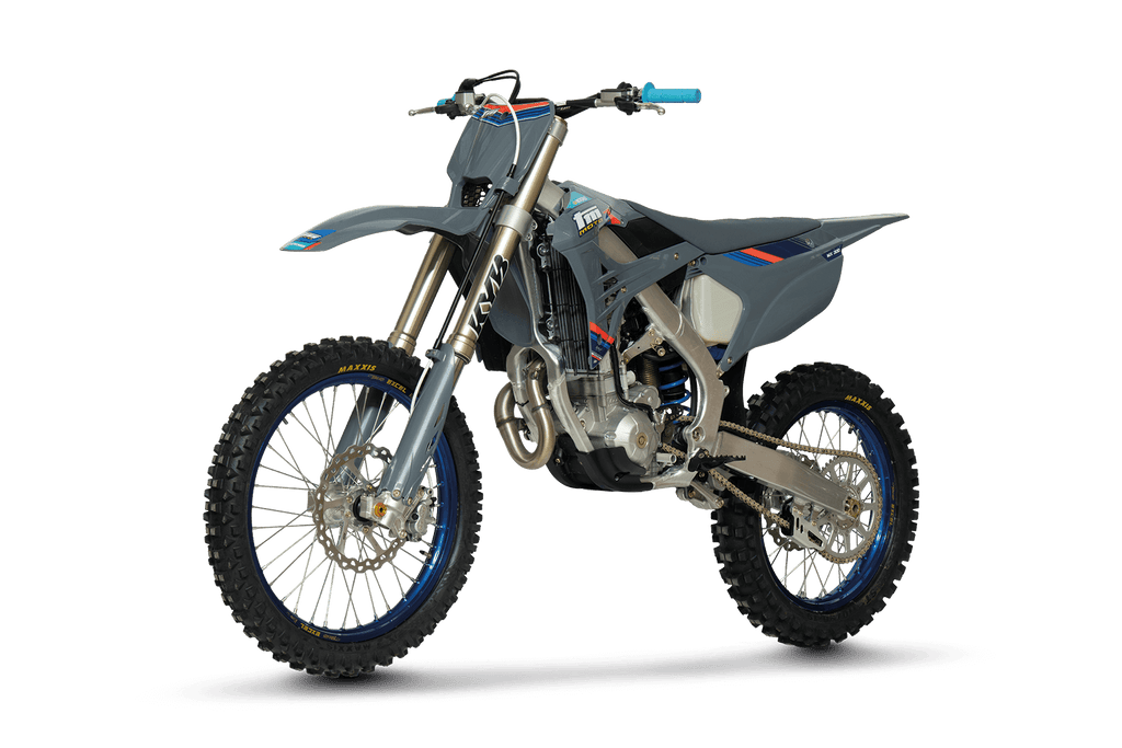 TM dirt bike on a black background