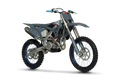 TM dirt bike on a black background